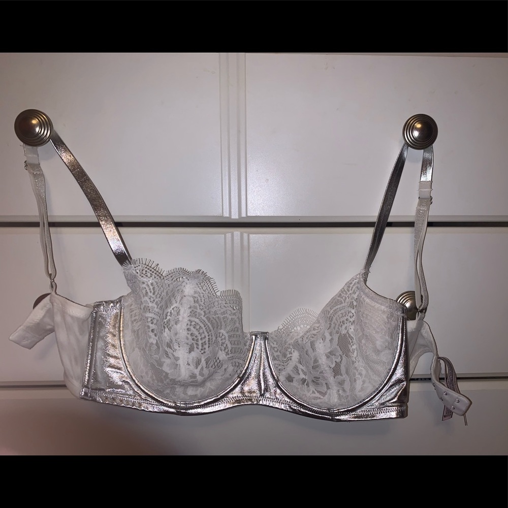 Not with tags but never worn. 32DDD